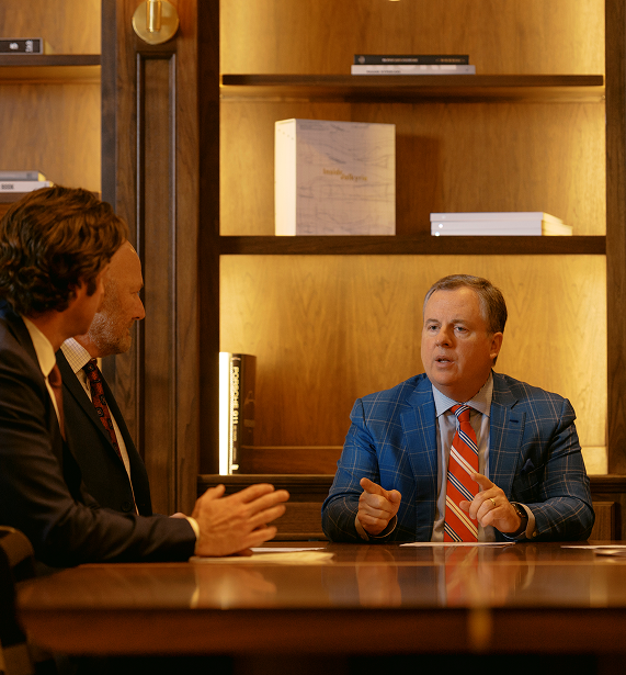 QII CEO Chad Williams and executive team members.